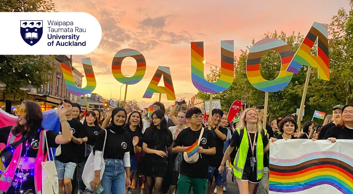 A group of UoA students and staff walking at the Auckland Rainbow Parade