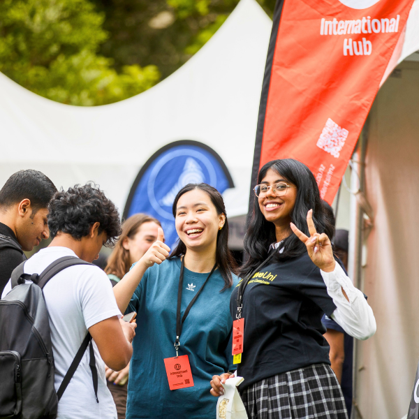 Two students smiling at the Clubs Expo